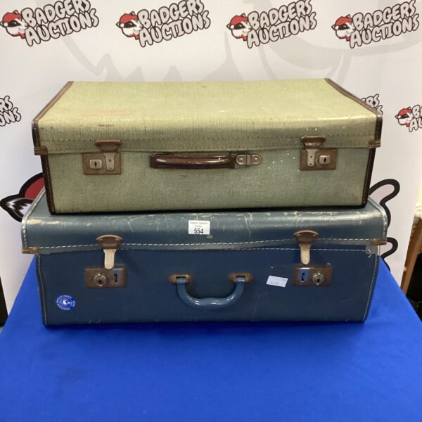 Pair of vintage suitcases, classic retro travel luggage.