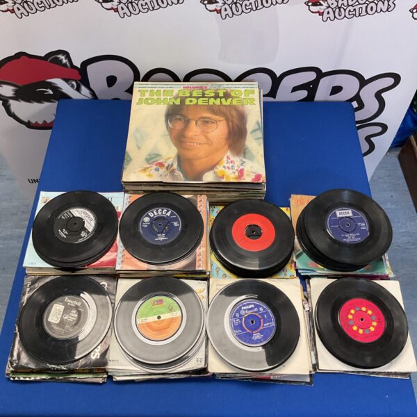 Large lot of vintage vinyl records for music collectors.