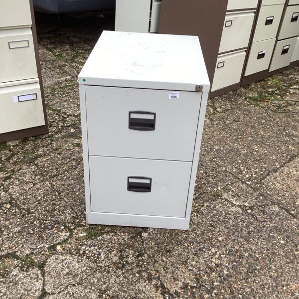 Vintage two-drawer metal filing cabinet for office storage.
