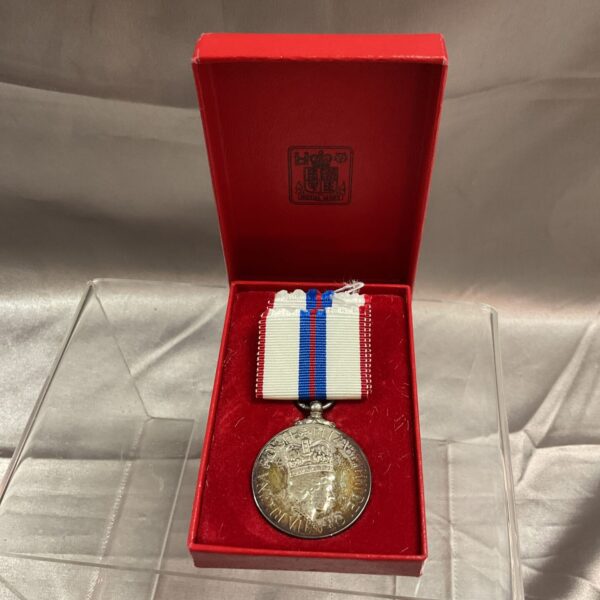 Queen's Silver Jubilee Medal in its original red presentation box.