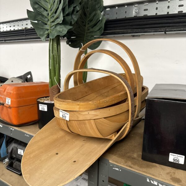 Set of three vintage wooden garden trugs for harvesting.
