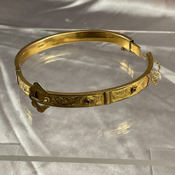 Vintage 9ct gold bracelet with a belt buckle design.