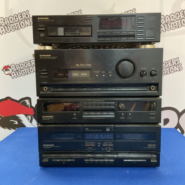Vintage Technics hi-fi stack with CD changer, cassette deck and equaliser.