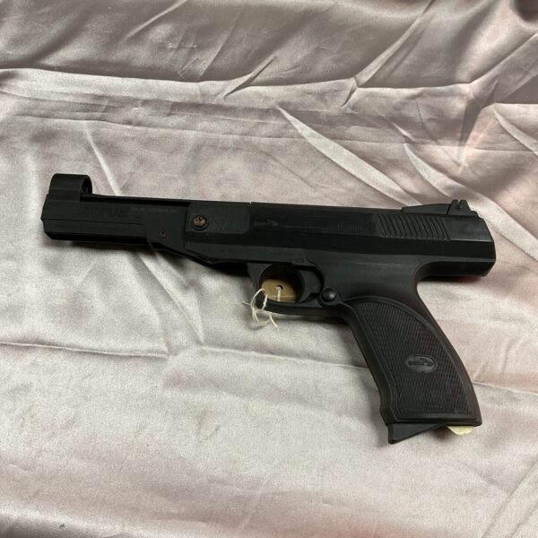 Black Gamo P-800 .177 air pistol for target practice.