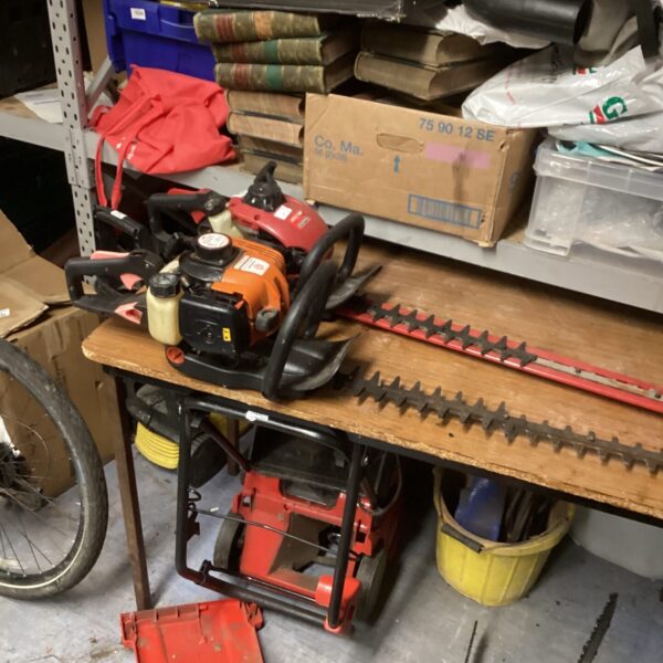 Mountfield and Parker petrol hedge trimmers for garden maintenance.