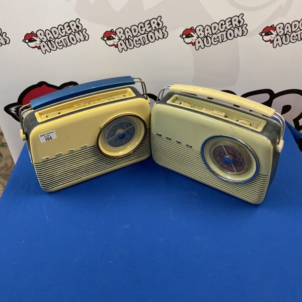 Pair of vintage Bush retro FM radios on display.