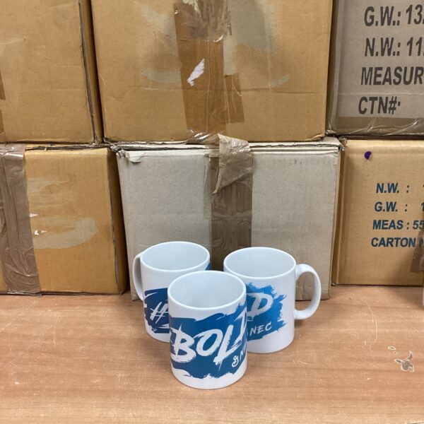Stack of branded mugs featuring the Bold & NEC logo.