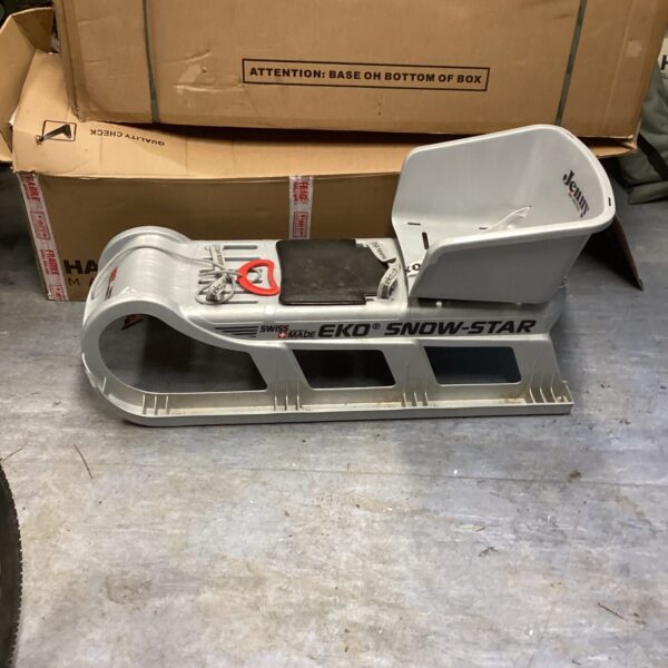 Vintage Eko Snow Sledge, a classic winter toy.