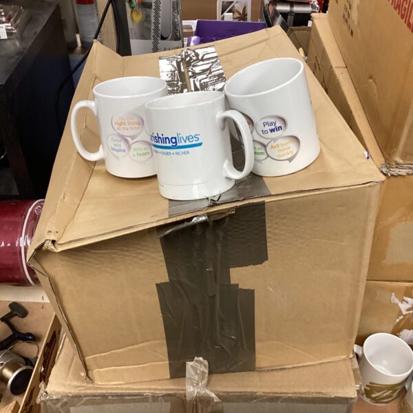 Bulk lot of branded mugs with nourishing lives logo.