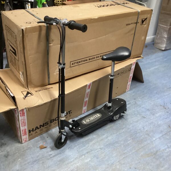 Used folding electric scooter with a metal frame and handlebar.