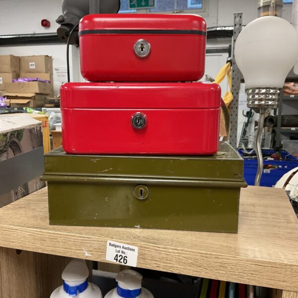 Lot of three vintage metal cash boxes with keys.