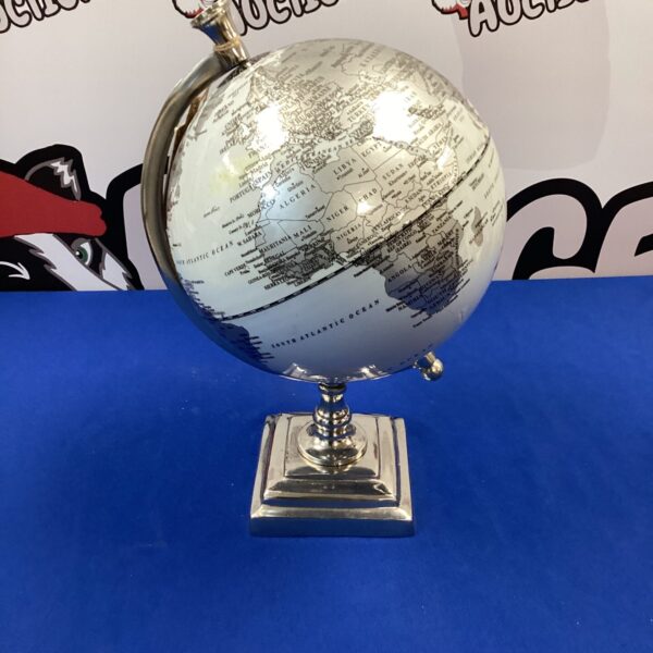Vintage chrome globe on stand, handmade in India.