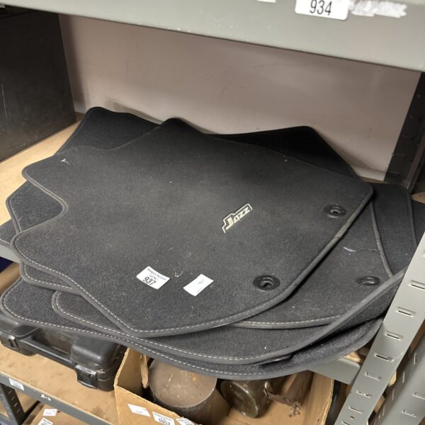 Set of used Honda Jazz floor mats for car interior protection.
