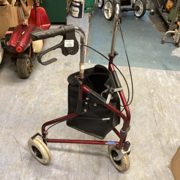 Vintage three-wheeled walking aid trolley for assisted mobility.