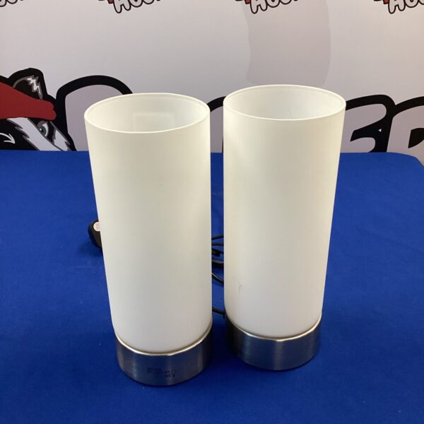 Pair of vintage chrome and glass table lamps for bedside or desk.