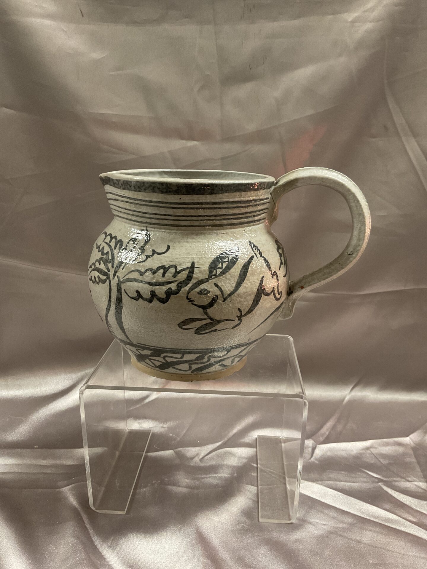 810 1926 Studio pottery jug decorated with rabbits Signed S F