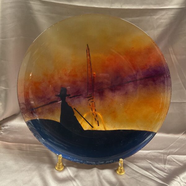 Lars Sestervik art glass charger with swirling colours.
