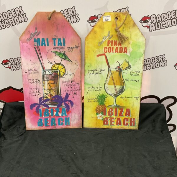 Vintage cocktail bar signs advertising classic drinks.