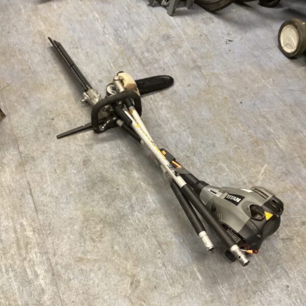 Titan petrol multi tool with hedge trimmer attachment for garden maintenance.