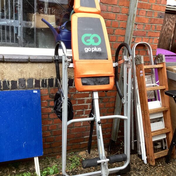 Used Goplus back extension machine for home fitness.