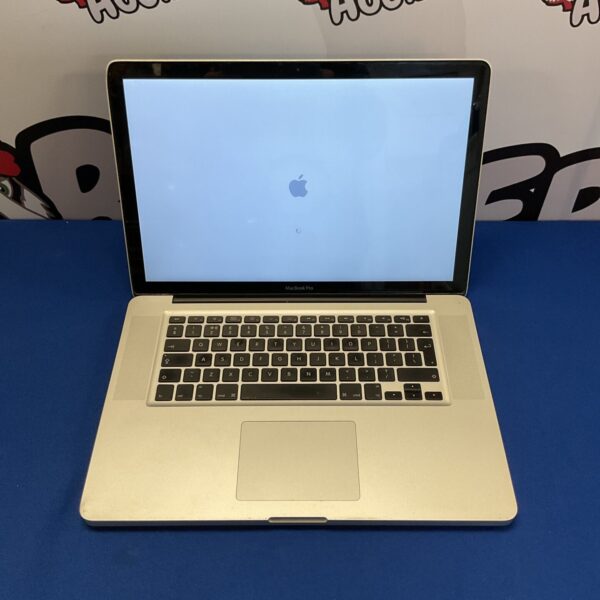 Silver Apple Macbook Pro laptop, open view.