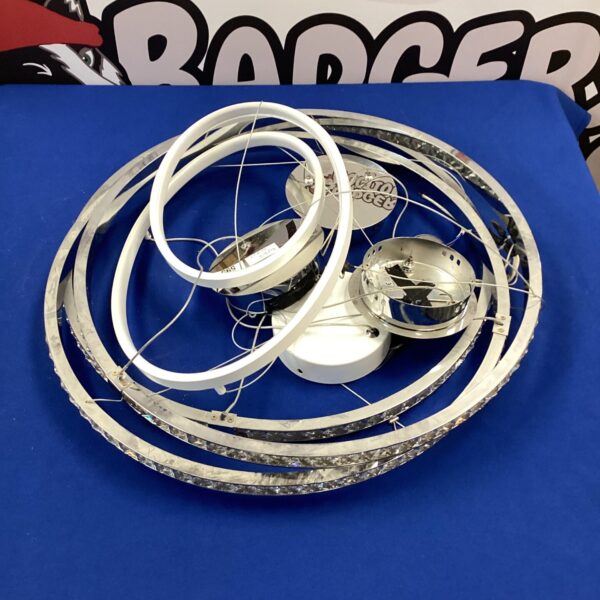 Lot of four white circular LED ceiling lights for modern interiors.