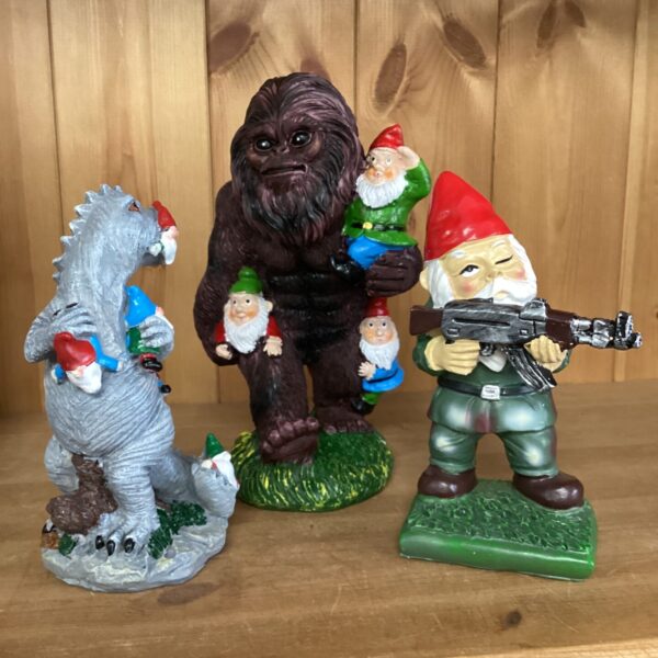 Trio of whimsical gnome ornaments for garden or home decor.