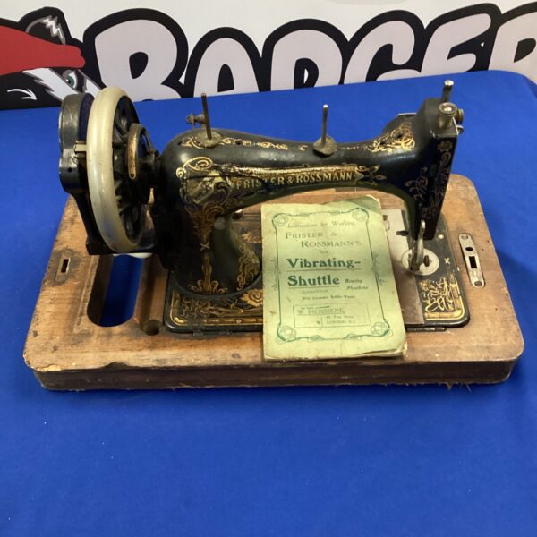 Vintage Frister & Rossmann sewing machine in detailed view.