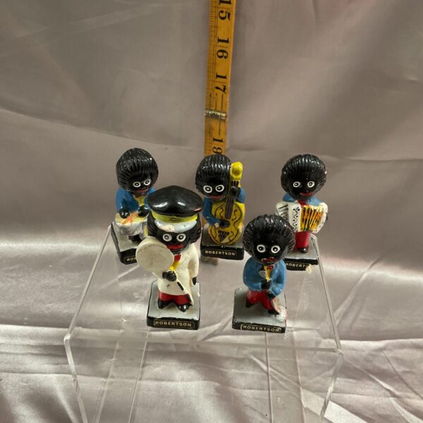 Vintage Robertson Golly band figures and road crossing man collectible.