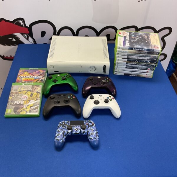 Xbox 360 console bundle with games and controllers for retro gaming.