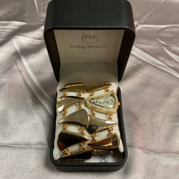 Vintage Philip Mercier watch and matching gold tone bracelet set.