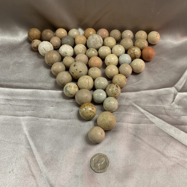 Vintage stone marble lot with varied colours and patterns.