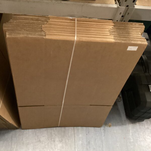 Stack of twenty folding cardboard boxes for storage and moving.