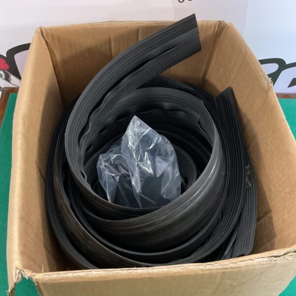 Lot of flexible plastic cable tidies for cable management.