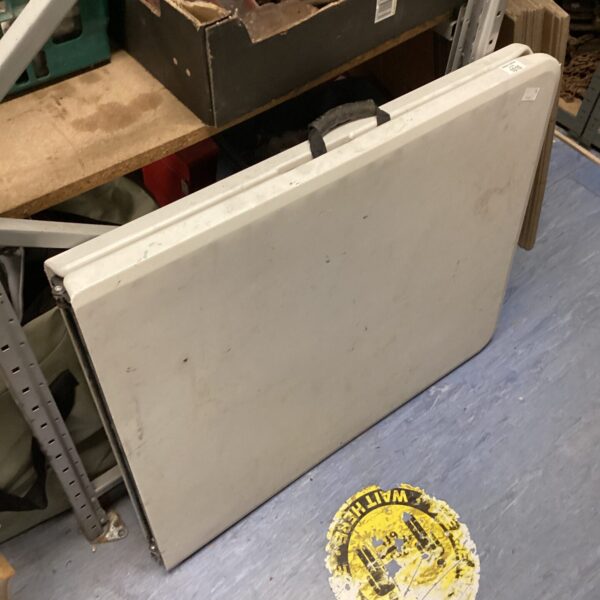 Vintage folding pasting table for workshop or craft use.