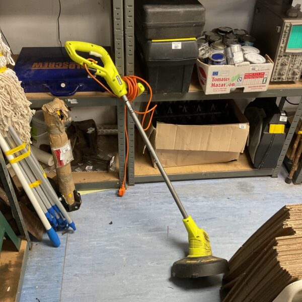 Ryobi electric garden strimmer for lawn and garden maintenance.