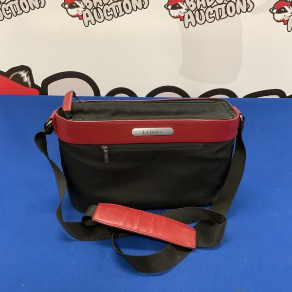 Black and red Panasonic Lumix camcorder bag with shoulder strap.
