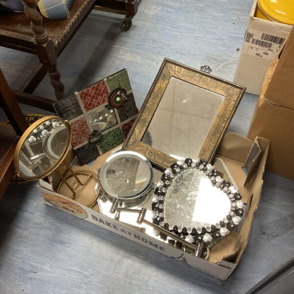 Assorted mirrors lot with heart and floral designs.