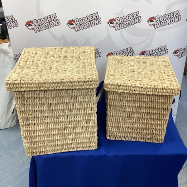 Pair of woven wicker storage boxes for home organisation.
