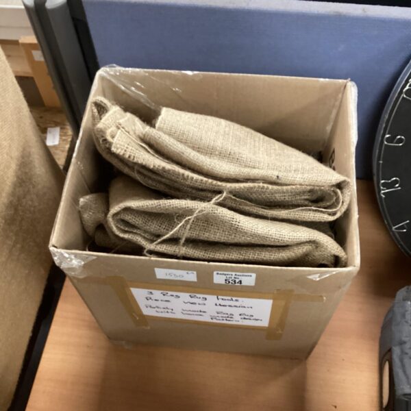 Vintage rag rug tools and hessian fabric for crafting.