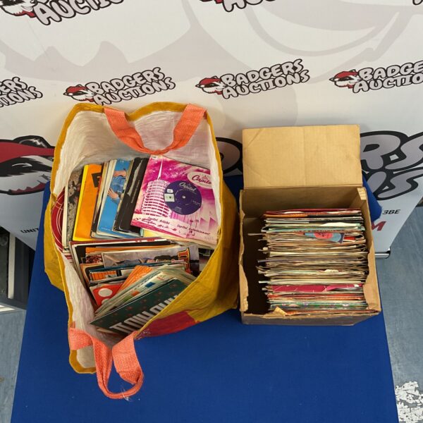 Mixed lot of vintage vinyl records for collectors and music lovers.