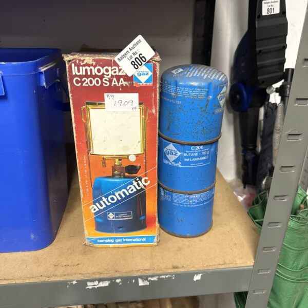 Vintage Camping Gaz C206 lamp with three fuel canisters.