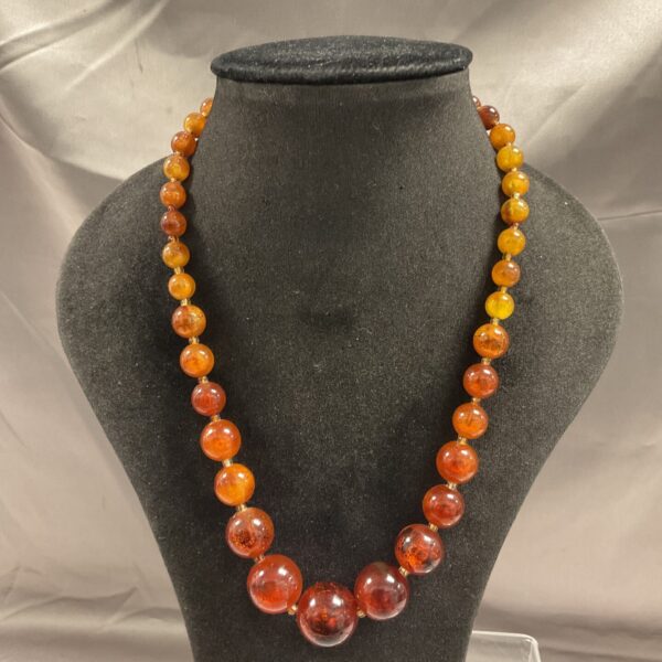 Vintage amber bead necklace with graduated beads.