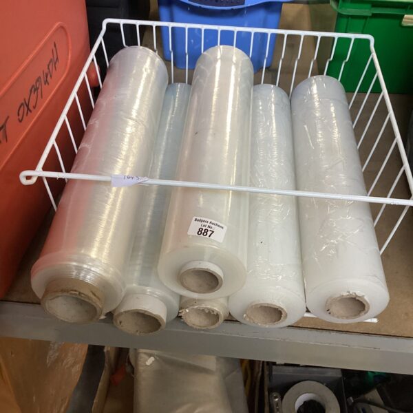 Large rolls of clear cling film for kitchen food preservation.