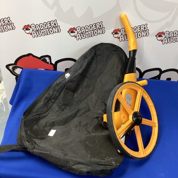 Yellow Trumpeter Measuremeter distance measuring wheel for land surveying.
