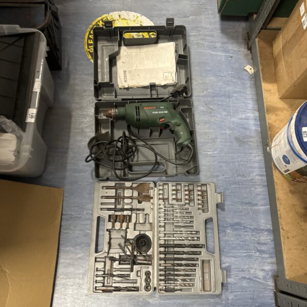 Vintage Bosch PSB 600RE power drill in its original case.