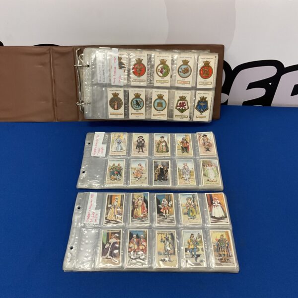 Vintage cigarette card album with De Reszke cards visible.