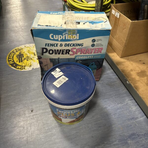 Cuprinol fence sprayer with partially used paint tub for garden maintenance.