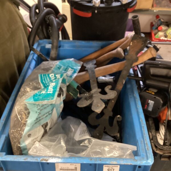 Mixed lot of garden tools and hanging basket brackets.
