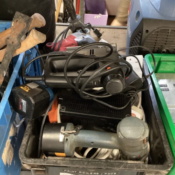 Ryobi power drill within a mixed lot of tools.
